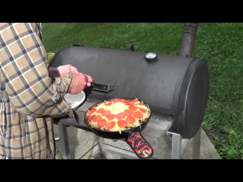 pizza on the grill .