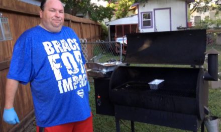 Smoking brisket on a traeger pellet grill.