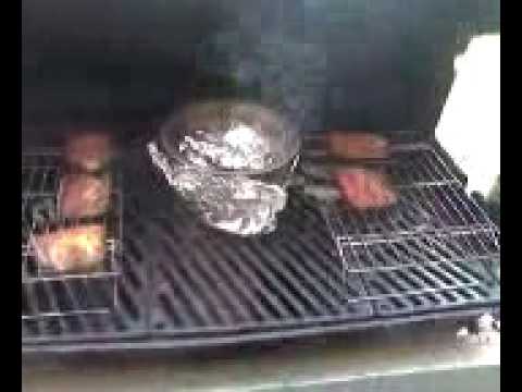 Functional Gas grill turned into a Smoker using Charcoal and hard wood.